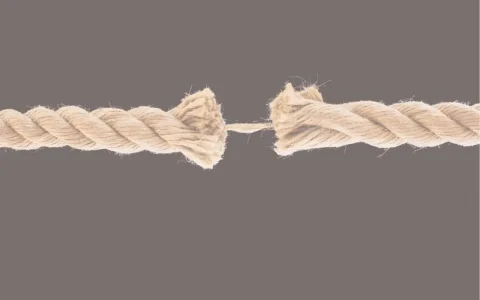 "Frayed rope nearly breaking apart, symbolising the separation and structural tension of an SMSF divorce split."